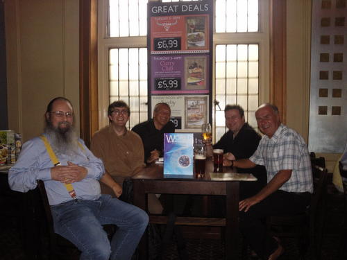 [IMG: The assembled company]
