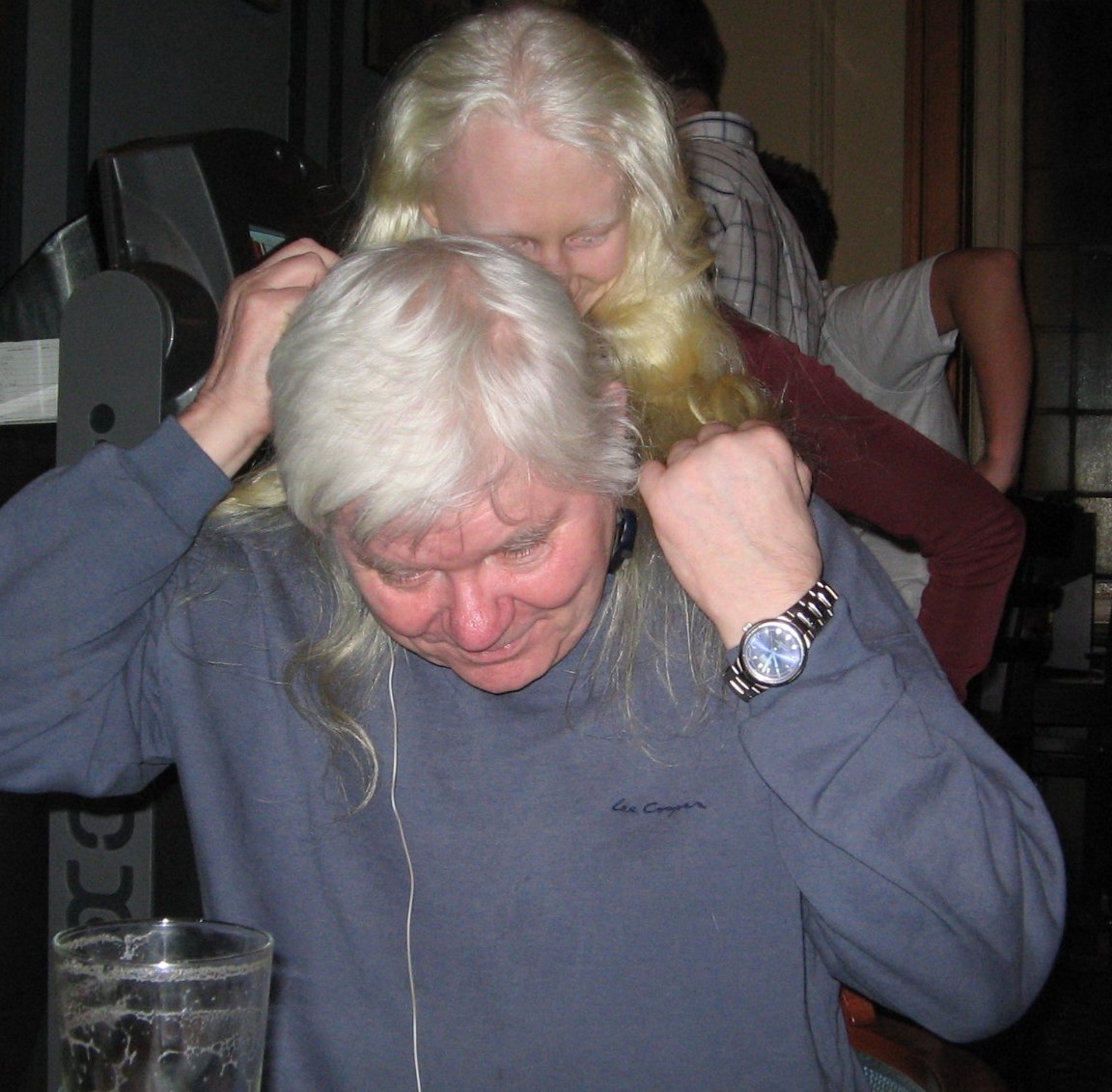 [IMG: Mick borrows Lardy's hair]